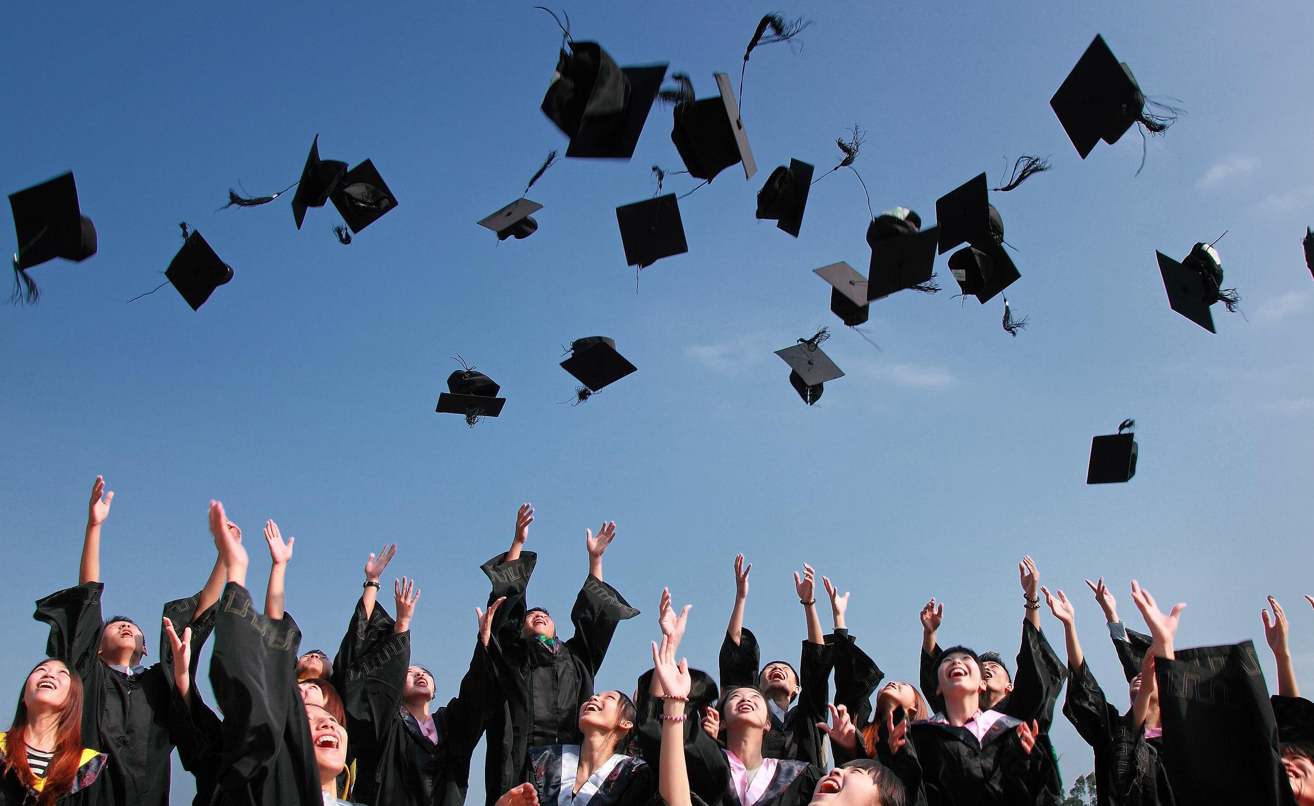 Students celebrating graduation